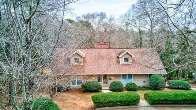 Incredible lakefront home with two-story dock, WiFi, & game room